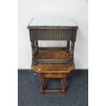 A mid 20th century oak sewing table and an oak side table