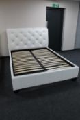 A 5' white leather bed frame