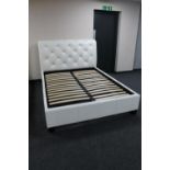 A 5' white leather bed frame