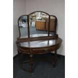 A Duchess style dressing table with triple mirror