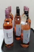 Eleven bottles of Pinor Grigio blush and rose wine