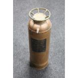 An antique copper and brass Danish fire extinguisher