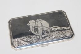 An early twentieth century finely detailed Sterling silver niello cigarette case with gilt interior