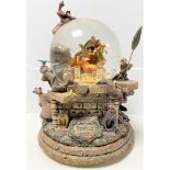 A Disney Jungle Book snow globe in original box