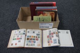 A box of albums of stamps,