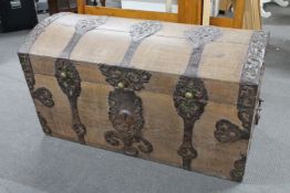 A 19th century domed topped shipping trunk with key and metal fittings CONDITION REPORT: