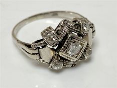 An Art Deco platinum and diamond ring,