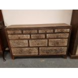 An Eastern carved hardwood multi drawer chest,