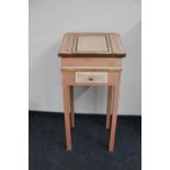 A painted clerk's desk fitted with a drawer on legs