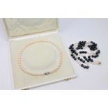 A continental cultured pearl necklace on 14ct white gold diamond and pearl set clasp, length 39cm.