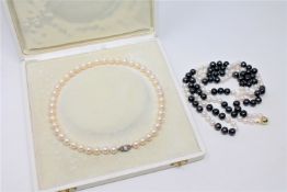 A continental cultured pearl necklace on 14ct white gold diamond and pearl set clasp, length 39cm.