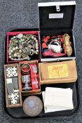 A tray of assorted costume jewellery, boxed dominoes and chess set, silver plated pieces,