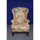 A mid 20th century Parker Knoll wingback chair