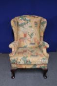 A mid 20th century Parker Knoll wingback chair