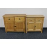 Two contemporary oak double door cabinets fitted with two drawers