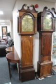 An antique mahogany longcase clock with later eight day movement with brass dial signed John