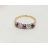 An 18ct gold five stone ruby and diamond ring,