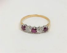 An 18ct gold five stone ruby and diamond ring,
