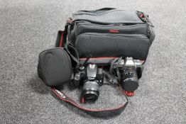 A Pentax P30 camera in bag,