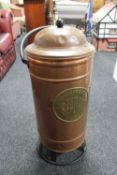 A 20th century copper lidded vessel with handle bearing a brass plaque Handsprojten Reform H.A.G.S.