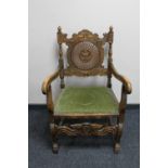 An early twentieth century carved bergere armchair