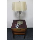 A mahogany ship's style lamp table with brass mounts together with a table lamp and shade