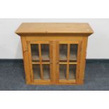 A pine double door cabinet