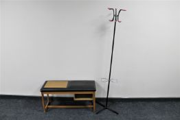 A mid 20th century metal hat and coat stand and a teak telephone seat