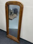 A late nineteenth century continental walnut hall mirror
