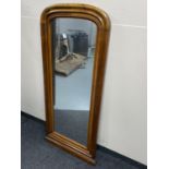 A late nineteenth century continental walnut hall mirror