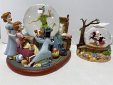Two Disney snow globes (as found) : Peter Pan and Mickey Mouse
