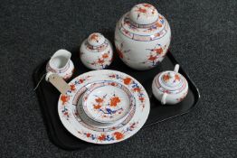 A tray of eight pieces of Chinese pottery, lidded ginger jars, sugar basin and milk jug,