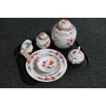 A tray of eight pieces of Chinese pottery, lidded ginger jars, sugar basin and milk jug,