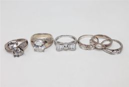 Six silver dress rings