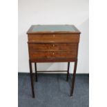 A 20th century mahogany clerk's desk on stand
