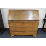 A 19th century oak writing bureau