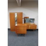 A mid twentieth century teak CWS Ltd three piece bedroom suite