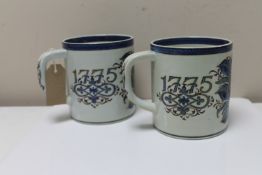 A pair of extra large Royal Copenhagen Faience tankards, height 13.