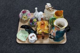 A tray of Burlington Ware character jug, cottage ware teapot, Poole dolphin, Carlton Ware dish,