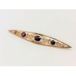 A Victorian almandine garnet and pearl brooch