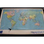 A mid 20th century pull down school map of the world by Hapag-Lloyd AG