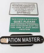 Three cast iron railway signs