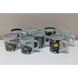 Eight Royal Copenhagen coffee mugs, height 7.