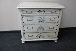 An antique pine hand painted chest on bun feet