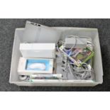 A box of Nintendo Wii with leads and accessories, Wii games, Wii fit board,