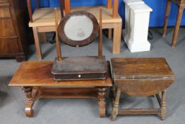 An antique mahogany mirrored wall shelf,