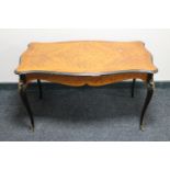 A French inlaid Kingwood style coffee table with ormolu mounts