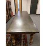 A large pine based and metal topped farmhouse table from 'The One', 299 cm x 100 cm.