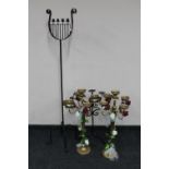 A tall metal candle stand,