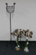 A tall metal candle stand,